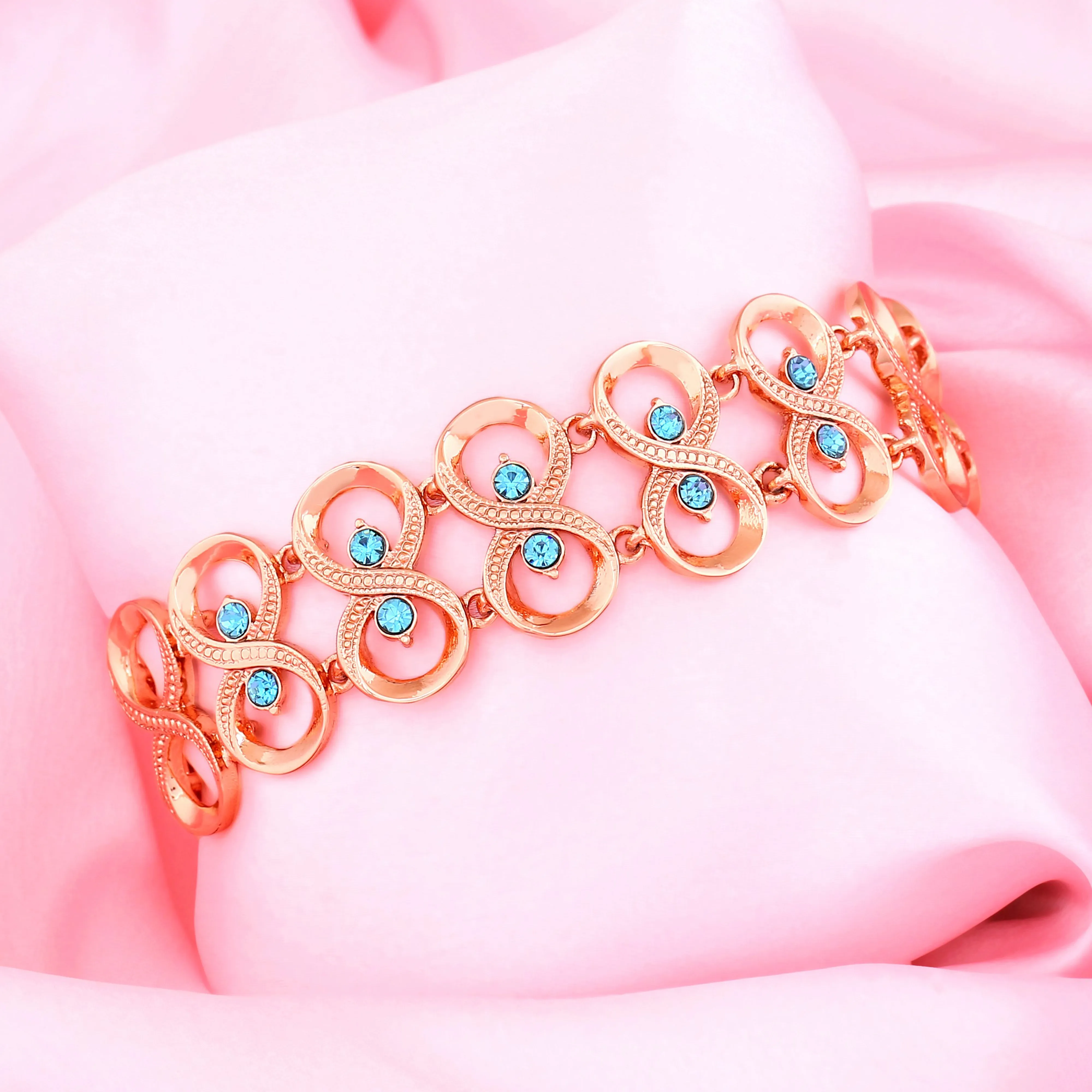 Estele Rose Gold Plated Sparkling Infinity Designer Bracelet with Blue Austrian Crystals for Women