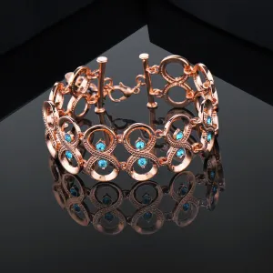 Estele Rose Gold Plated Sparkling Infinity Designer Bracelet with Blue Austrian Crystals for Women