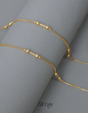 KT1011126 - Gold Toned pair Anklet