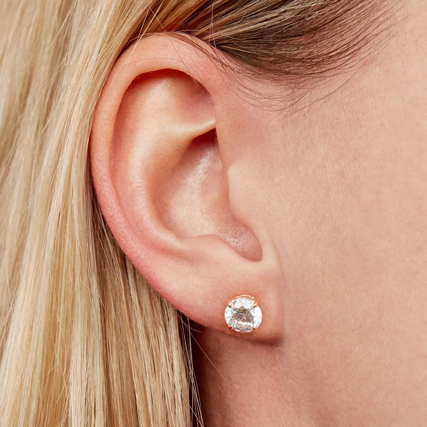 Round Brilliant stud earrings with 2.5 carats* of diamond simulants in 10 carat rose gold