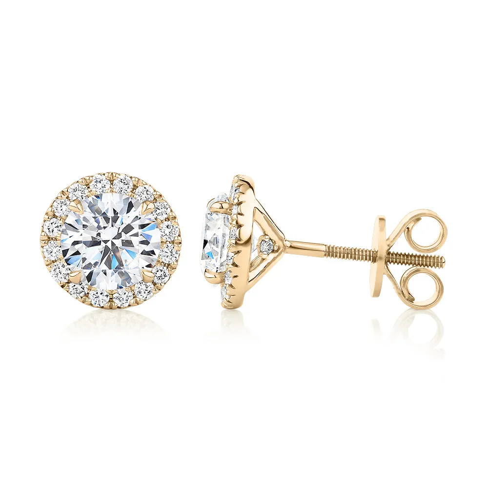 Signature Simulant Diamond 2.35 carat* TW round brilliant halo earrings in 14 carat yellow gold