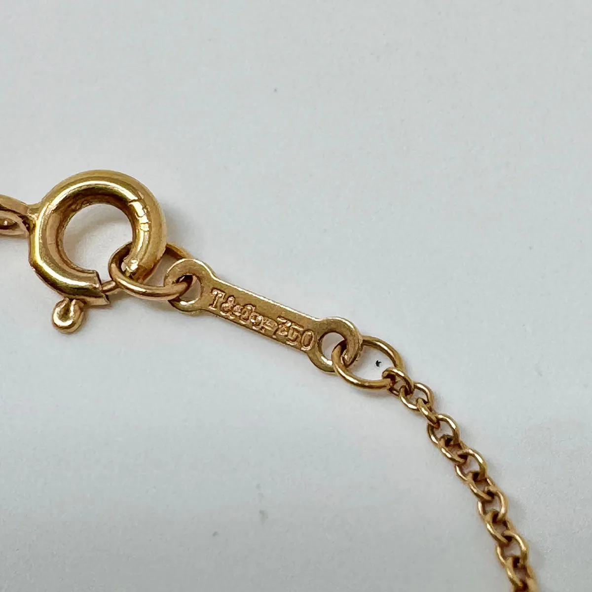 Tiffany & Co. 18K Gold Diamond Paloma Picasso Graffiti "Kiss" Pendant Necklace