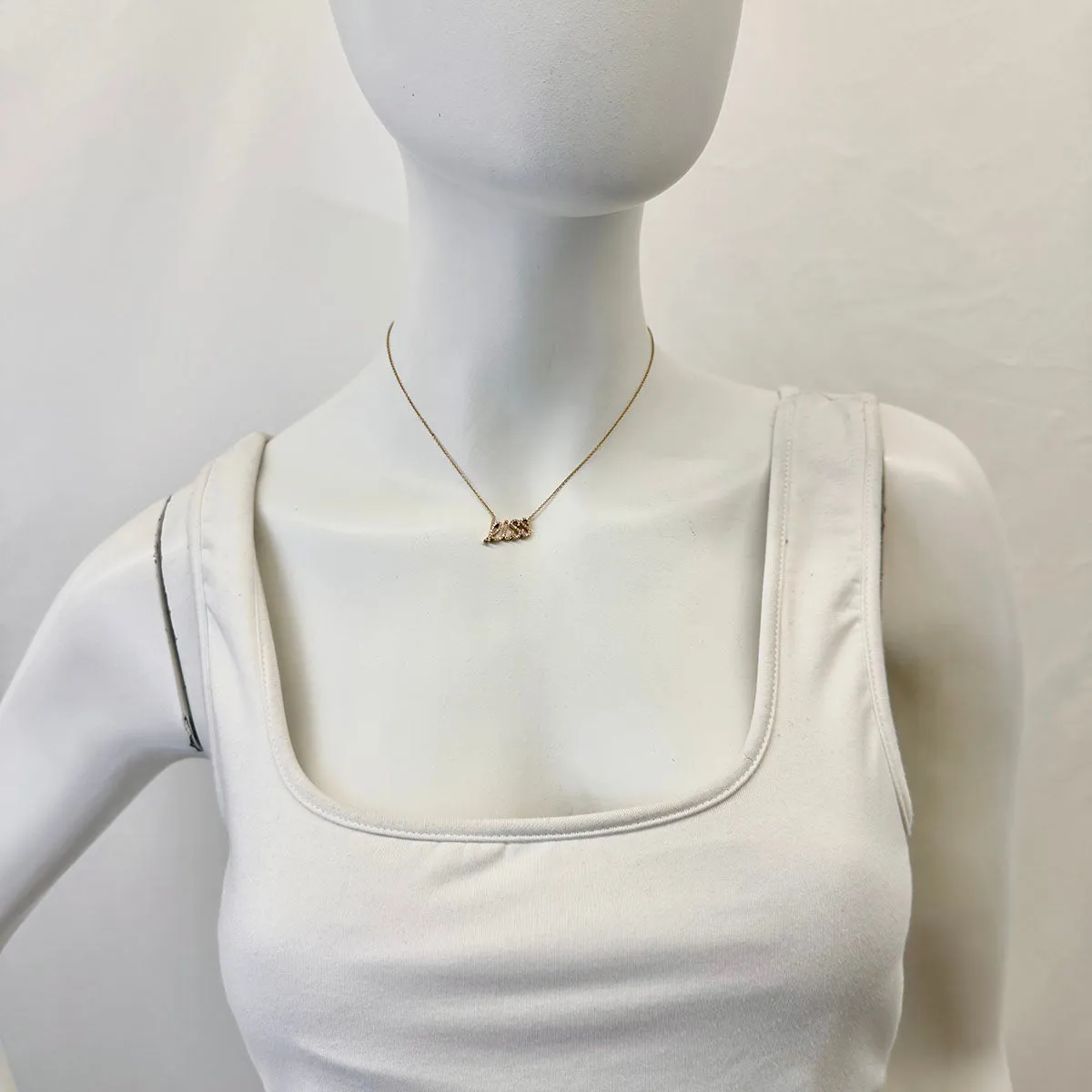 Tiffany & Co. 18K Gold Diamond Paloma Picasso Graffiti "Kiss" Pendant Necklace