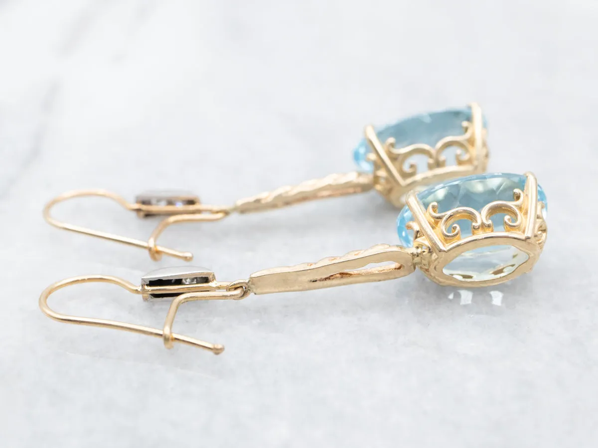 Twisting Blue Topaz and Diamond Drop Earrings