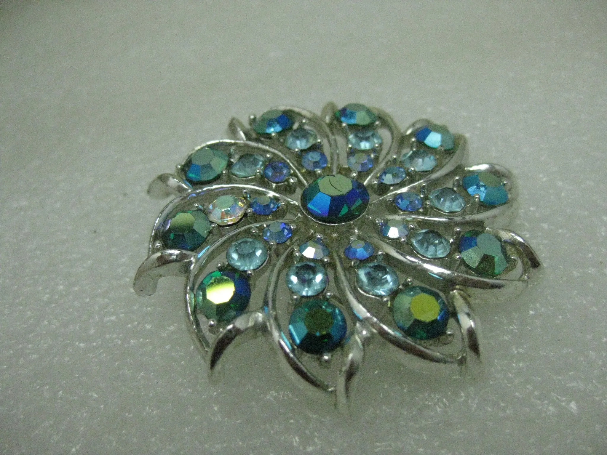 Vintage Silver Tone Spiral Rhinestone Brooch, Shades of Blue & Teal, 2", Mid-Century